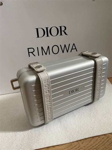 dior x rimowa clutch.